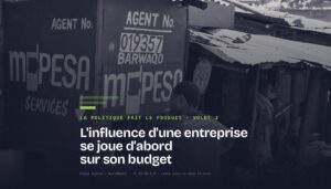 Carte du volet 3 « L'influence d'une entreprise se joue d'abord sur son budget » : un kiosque d'agent M-PESA portant un numéro d'agent peint à la main