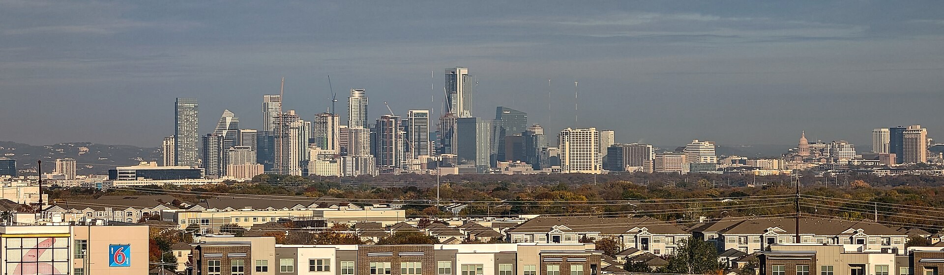 The skyscrapers of Austin, Texas, seen from a distance by day.