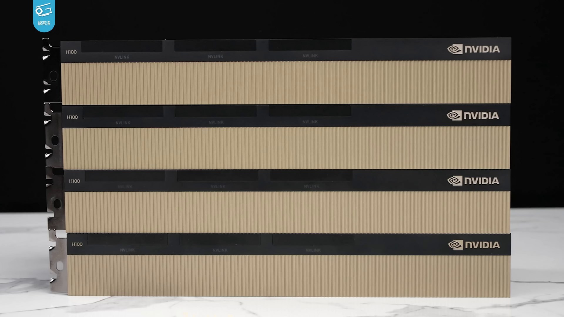Four stacked Nvidia H100 cards.